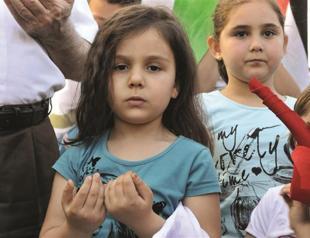 Israel defiant as rally marks raid anniversary