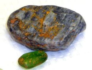 Woman burned by rocks she found near military zone