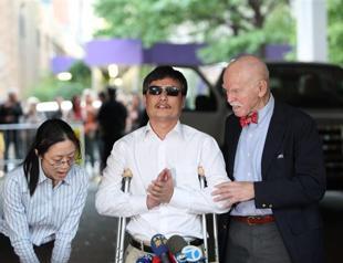 Blind Chinese dissident begins life in US