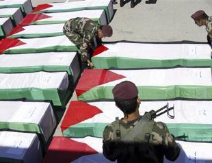 Israel hands over bodies of Palestinian militants