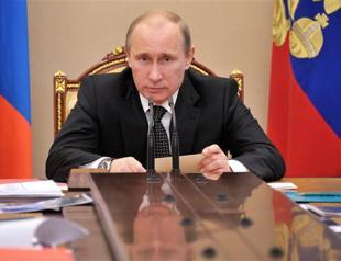 Putin visits Berlin, Paris amid divide over Syria