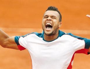 Tsonga sets up Djokovic last-eight clash