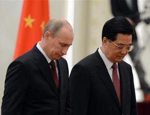 Battles in Syria as allies Russia, China meet