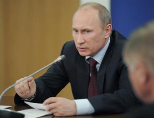 Russian protest leaders homes raided by police on rally eve