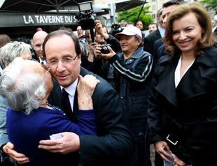 French president basks in leftists’ victory in elections