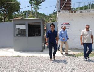 Atletico star Arda Turan visits Mehmet Ağar in jail