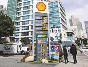 Oil production boom helps Shell beat earnings forecast