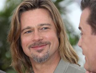 Pitt in Cannes as recession-hit contract killer