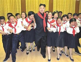 Kim speaks with youth in rare appearance