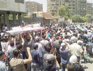 Hama massacre fuels calls on Assad to quit