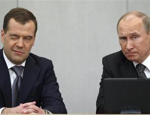 Putin, Medvedev seal Kremlin-PM job swap