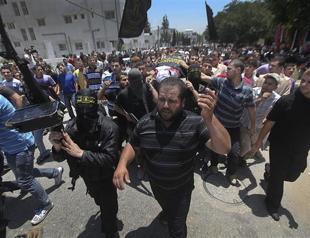 Israel raid kills 2 Gaza teens, prompts rare Hamas fire