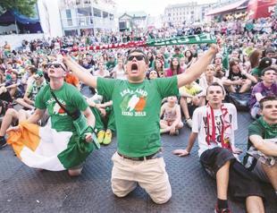 Divers searching river for missing Irish football fan