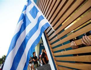 Greece clinches coalition deal to revise bailout