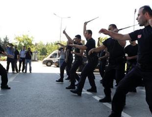 Turkish police given new spring-action batons