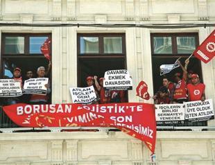 Workers occupy art center in wage protest