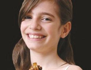 Teenage violinist lands plaudits