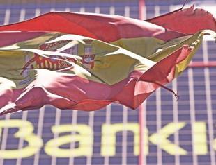 Spain says crisis stricken banks need up to 62 billion euros to survive slump