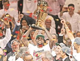 MVP James silences critics with first NBA title