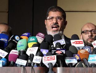 Egypts Morsi warns against tampering with poll result