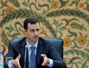 Assad says Syria in a state of war