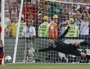 Fabregas penalty brings Spain full circle