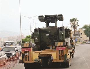 Turkey sends convoys of arms to its Syrian border