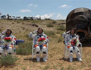 Chinese astronauts parachute land after mission