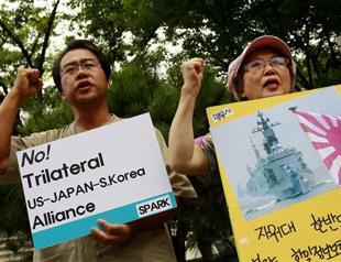 South Korea, Japan postpone landmark military pact