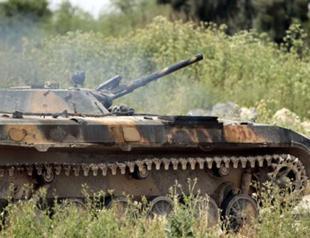 Syrian army amassing near Turkish border, FSA general claims
