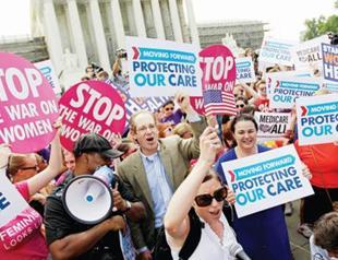 Obama, Romney trying to gain votes on Obamacare