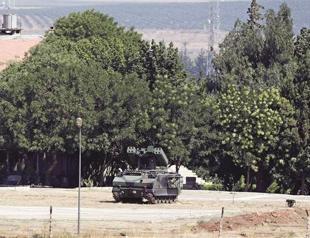 Turkey, Syria boost forces