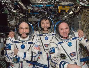 Three astronauts land on Earth from ISS in Russian capsule