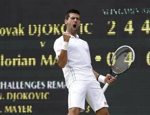 Champ Djokovic sets up Federer showdown