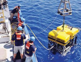 Bodies of downed jet pilots spotted in sea