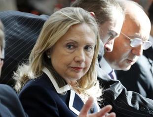 Clinton says Russia, China must pay price for aiding Assad