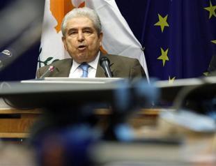 Cyprus says Greek bond deal killed its economy