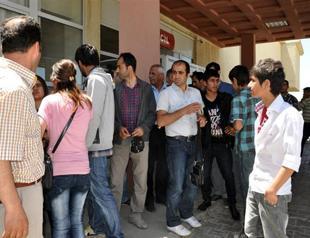 Students hurt as police use tear gas to break high school fight in Turkey