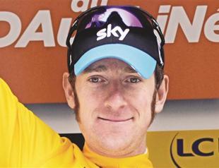 Britain’s Wiggins wins in the Alps