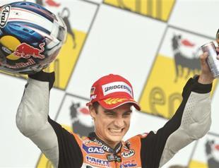 Pedrosa victorious as teammate crashes out