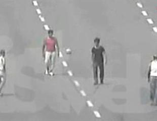 Drivers stranded in traffic play football on Istanbul bridge