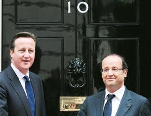 Hollande holds talks in London