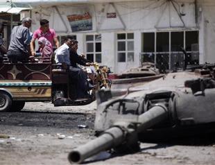 At least 63 killed as Syria violence hits new heights