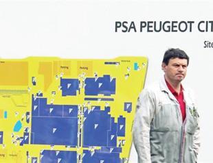Peugeot slashes jobs, sparks union reaction