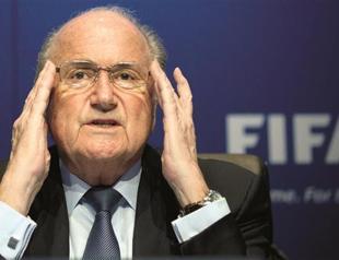 Blatter urged to explain bribe scandal
