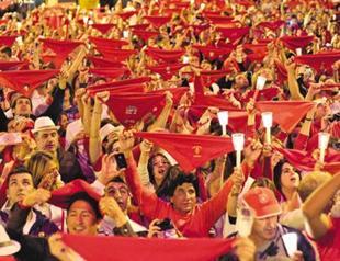Pamplona’s running of the bulls ends with candlelight ceremony