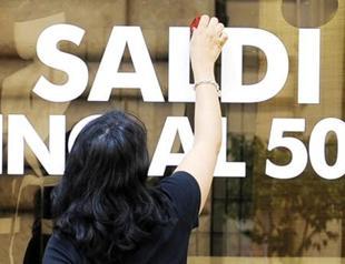 Italian bank shares hold despite cuts