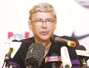 Van Persie ‘world class,’ says Wenger