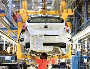 Eurozone factories feel heat in June, job cuts rise