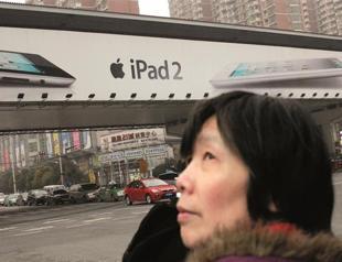 Apple settles Chinese iPad trademark fight